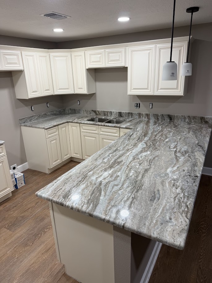 Kitchen with natural granite countertops and unique stone veining