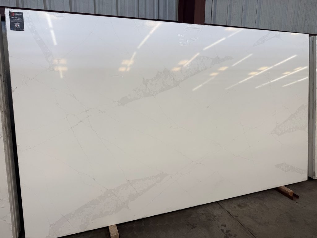 Warm beige quartz slab with soft natural movement