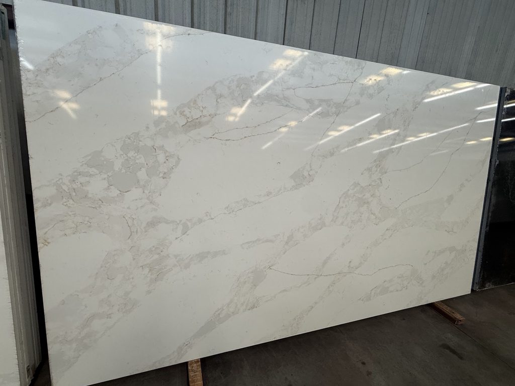 Warm beige quartz slab with soft natural movement