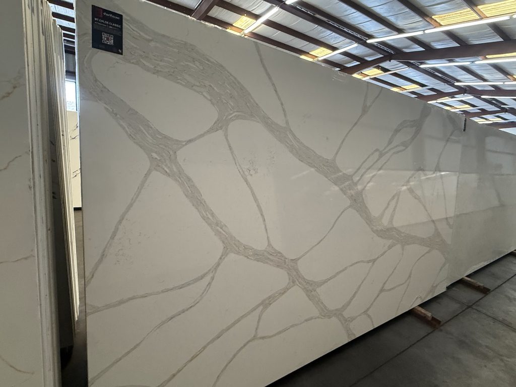 Warm beige quartz slab with soft natural movement
