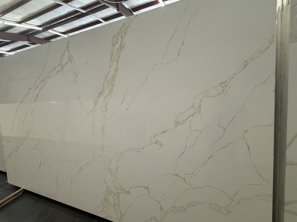 Light quartz countertop slab with minimal movement

Warm and Beige Quartz