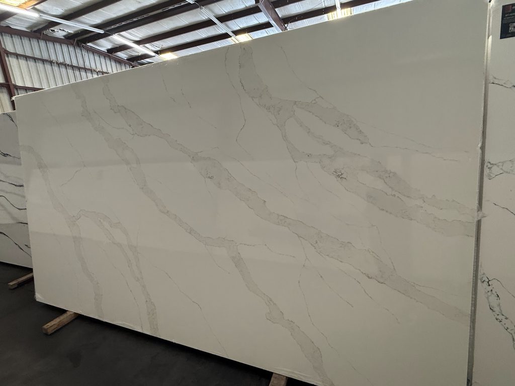 Light quartz countertop slab with minimal movement

Warm and Beige Quartz