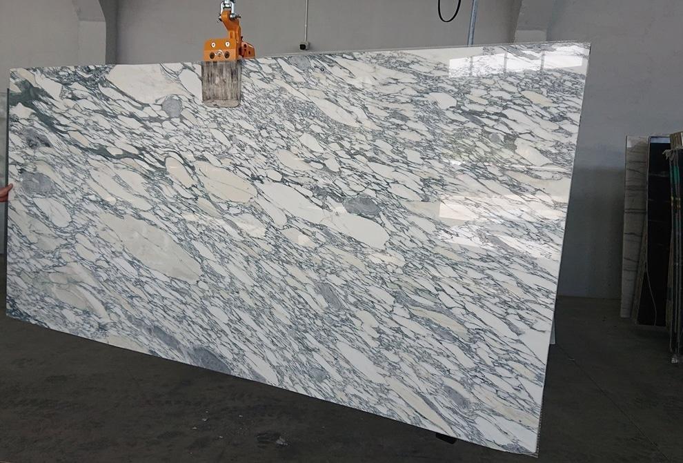 Arabescato marble slab with flowing gray veining and natural movement