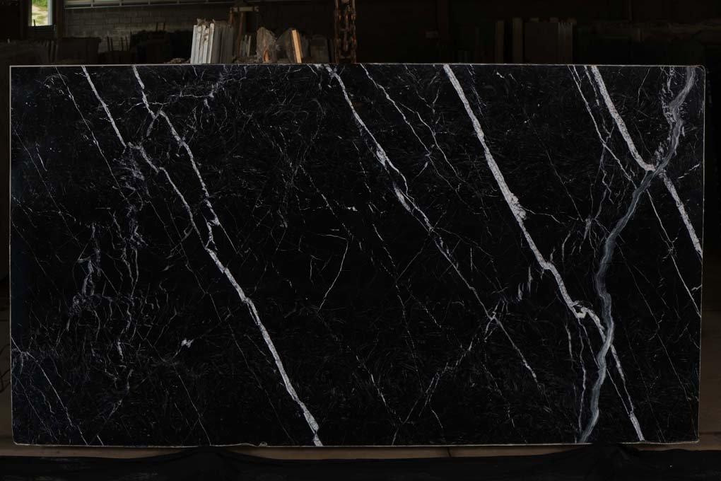 Nero Marquina marble slab with deep black background and white veining Marble Countertops in Jacksonville, FL
