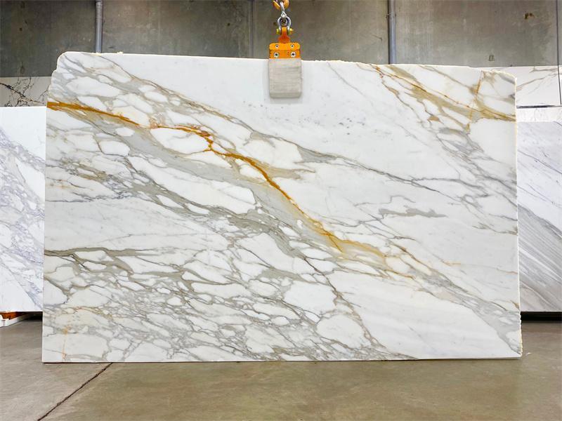 Calacatta Gold marble slab in Jacksonville FL with bold gray and gold veining Marble Countertops in Jacksonville, FL