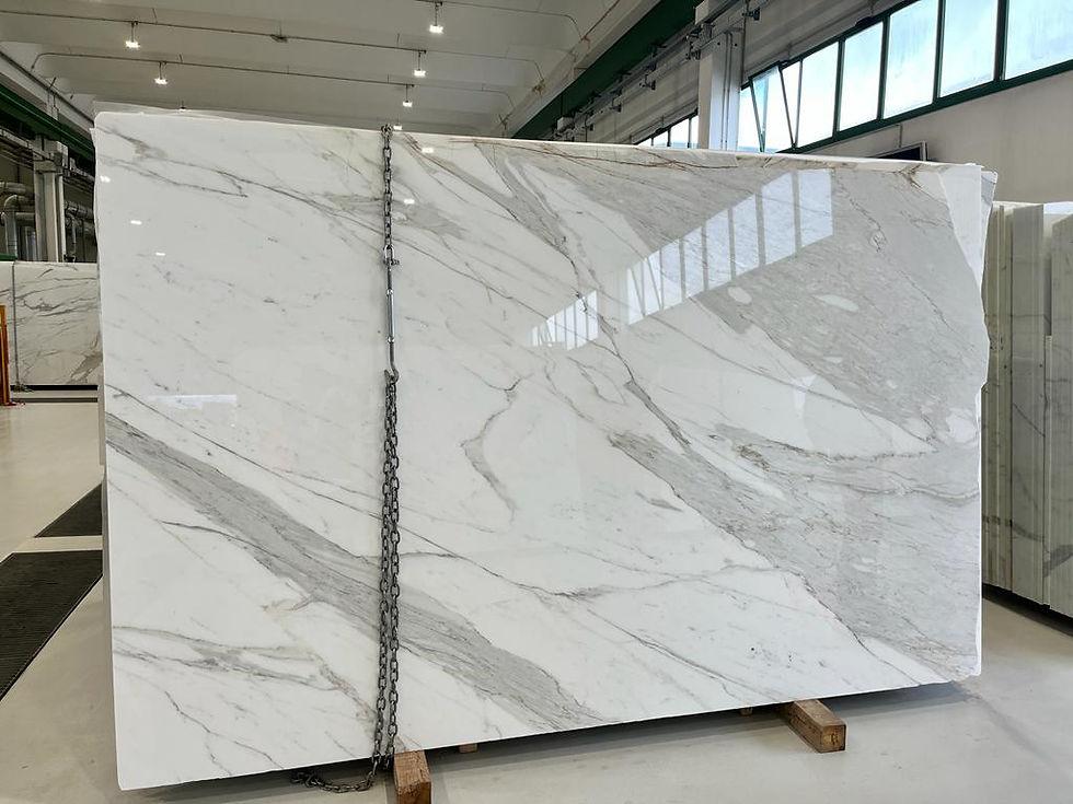 Statuario marble slab with bright white background and dramatic gray veins Marble Countertops in Jacksonville, FL